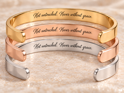 BLESSED Verso cuff bracelet in gold, rose gold and silver, showing the hidden inside engraving: Not untouched. Never without grace.