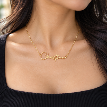 Woman wearing gold Christina name necklace