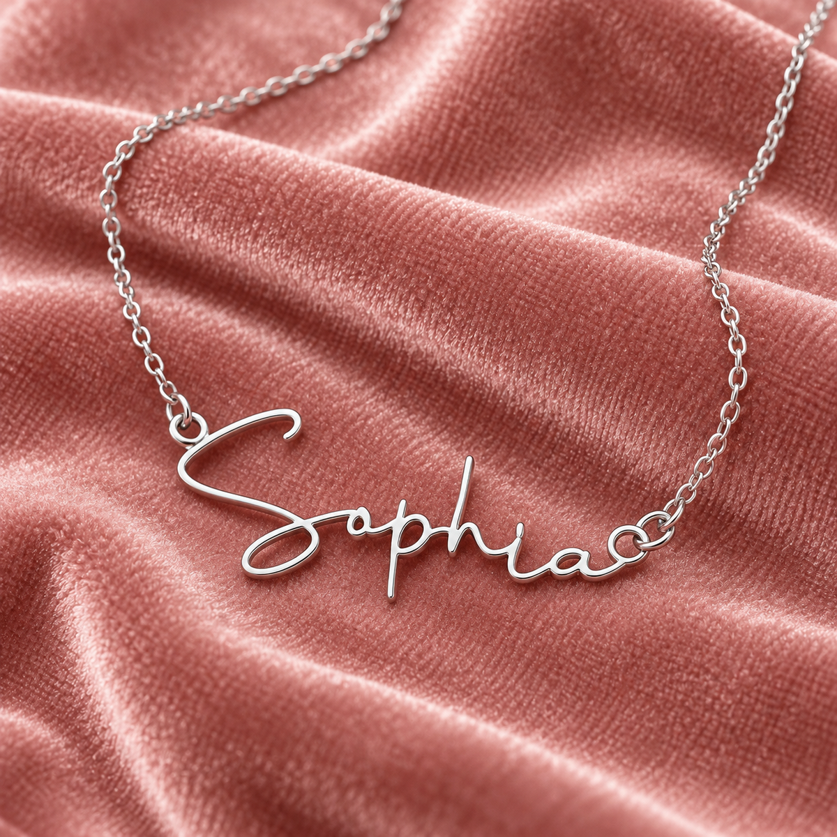 Silver Sophia name necklace on rose velvet