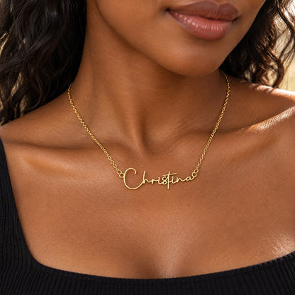 Woman wearing gold Christina name necklace