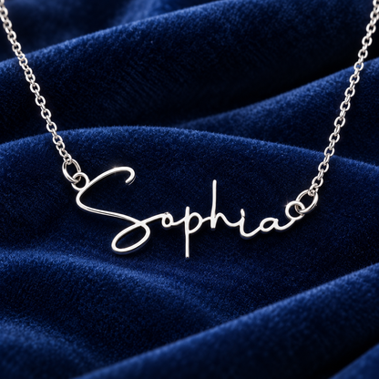 Signature Strength name necklace on blue velvet, silver