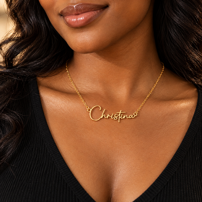 Woman wearing gold Christina name necklace