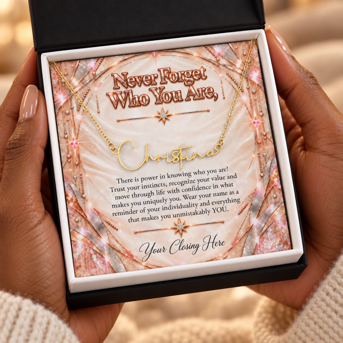 Ivory Rose Gold Luxe message card in black gift box held in hands