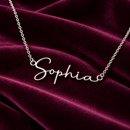 Silver Sophia name necklace on plum velvet