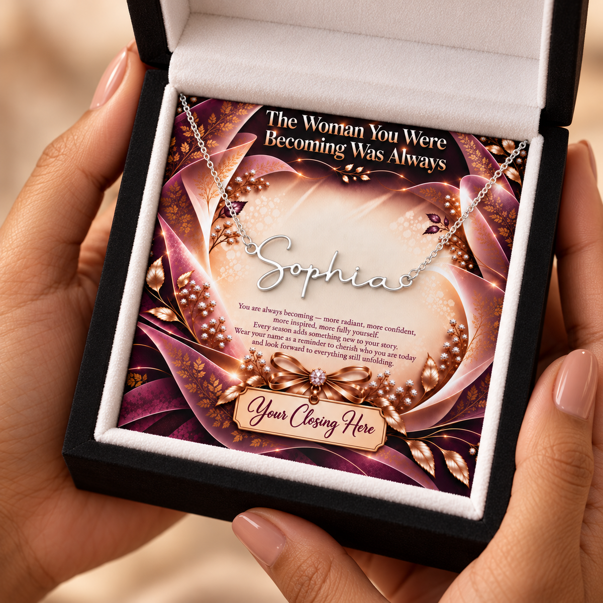 Plum Gold Luxe message card in black gift box held in hands