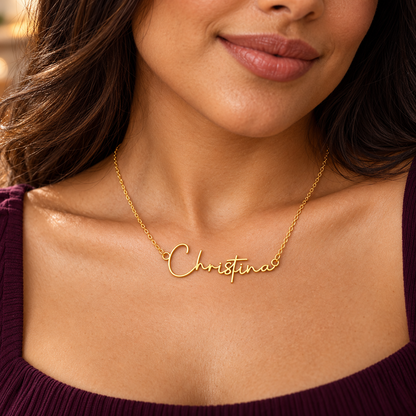Woman wearing gold Christina name necklace